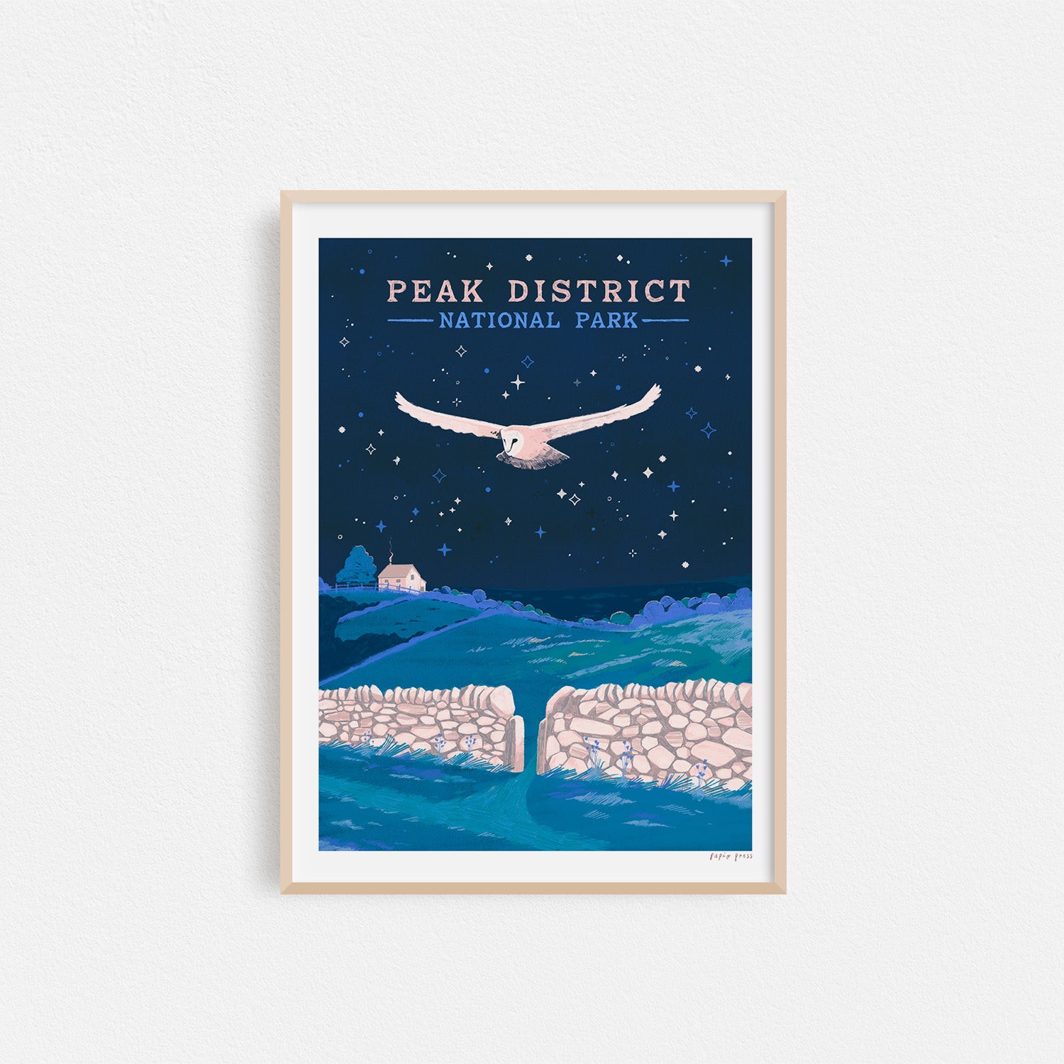 The Peak District National Park Artists Print by Papio Press showcases an original owl illustration flying over stone walls and green hills at night, printed on archival satin paper with PEAK DISTRICT NATIONAL PARK at the top.
