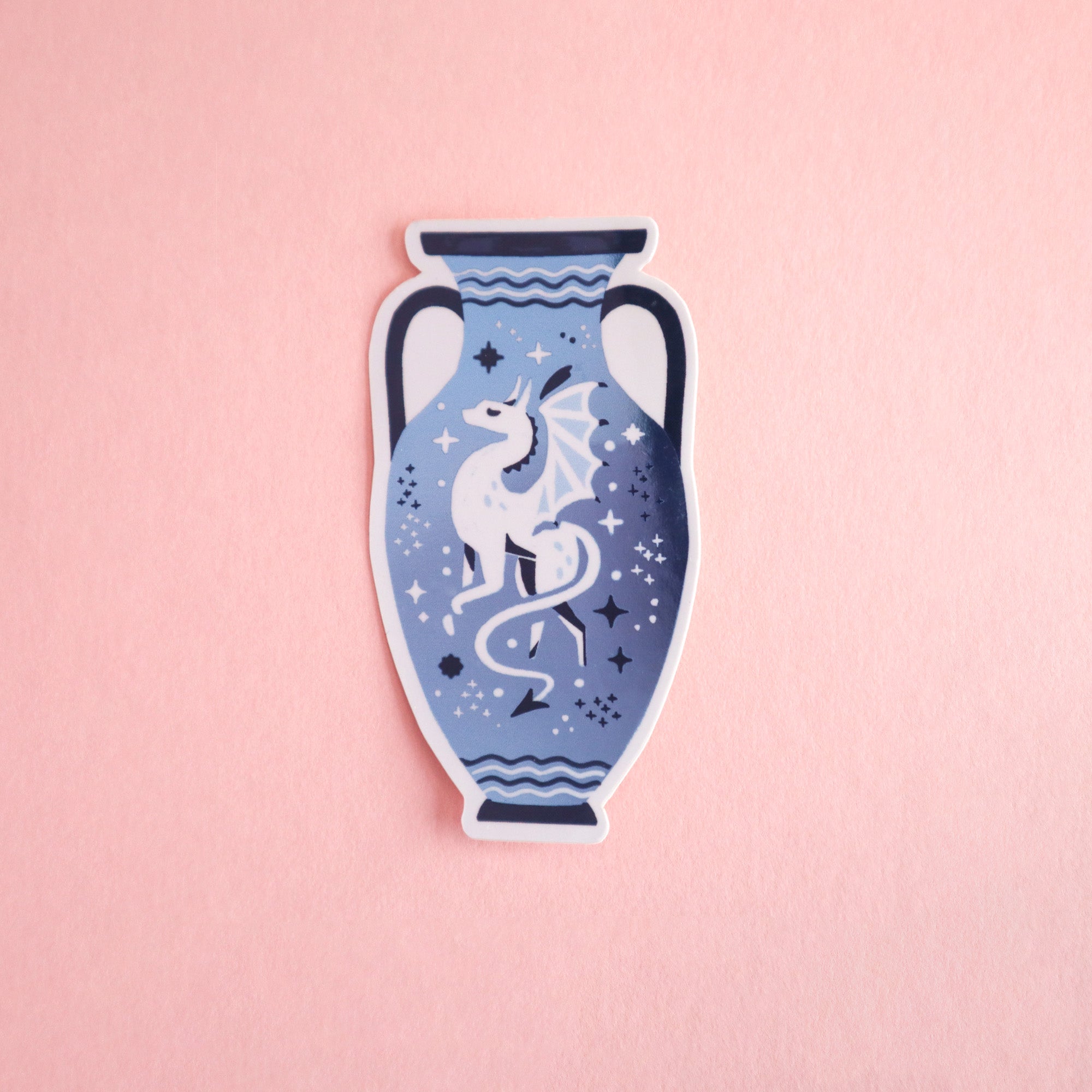 A set of three vase stickers by Papio Press, featuring unicorn, dragon, and snake designs with metallic finishes and star-like patterns, is shown against a light pink background.