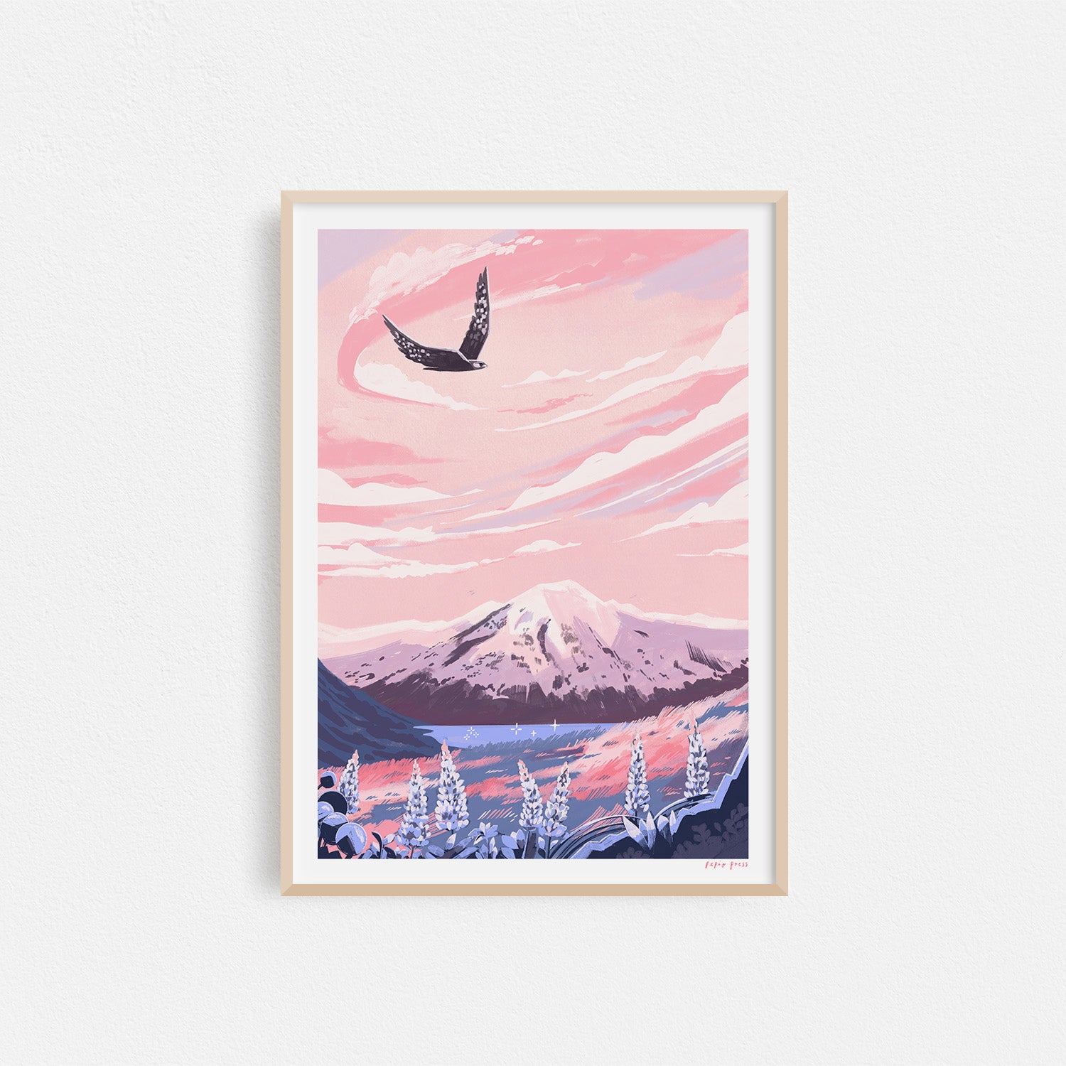 The "Mt. Cook National Park, New Zealand Artists Print" by Papio Press features a mountain landscape with snow-covered trees, a butterfly in the pink sky, and pastel clouds, beautifully reproduced on archival satin paper.