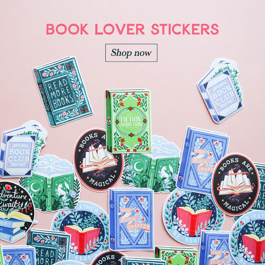 A photograph of a collection of vinyl book stickers taken on a pink background. It's captioned with 'Book Lover Stickers' and 'Shop now'.