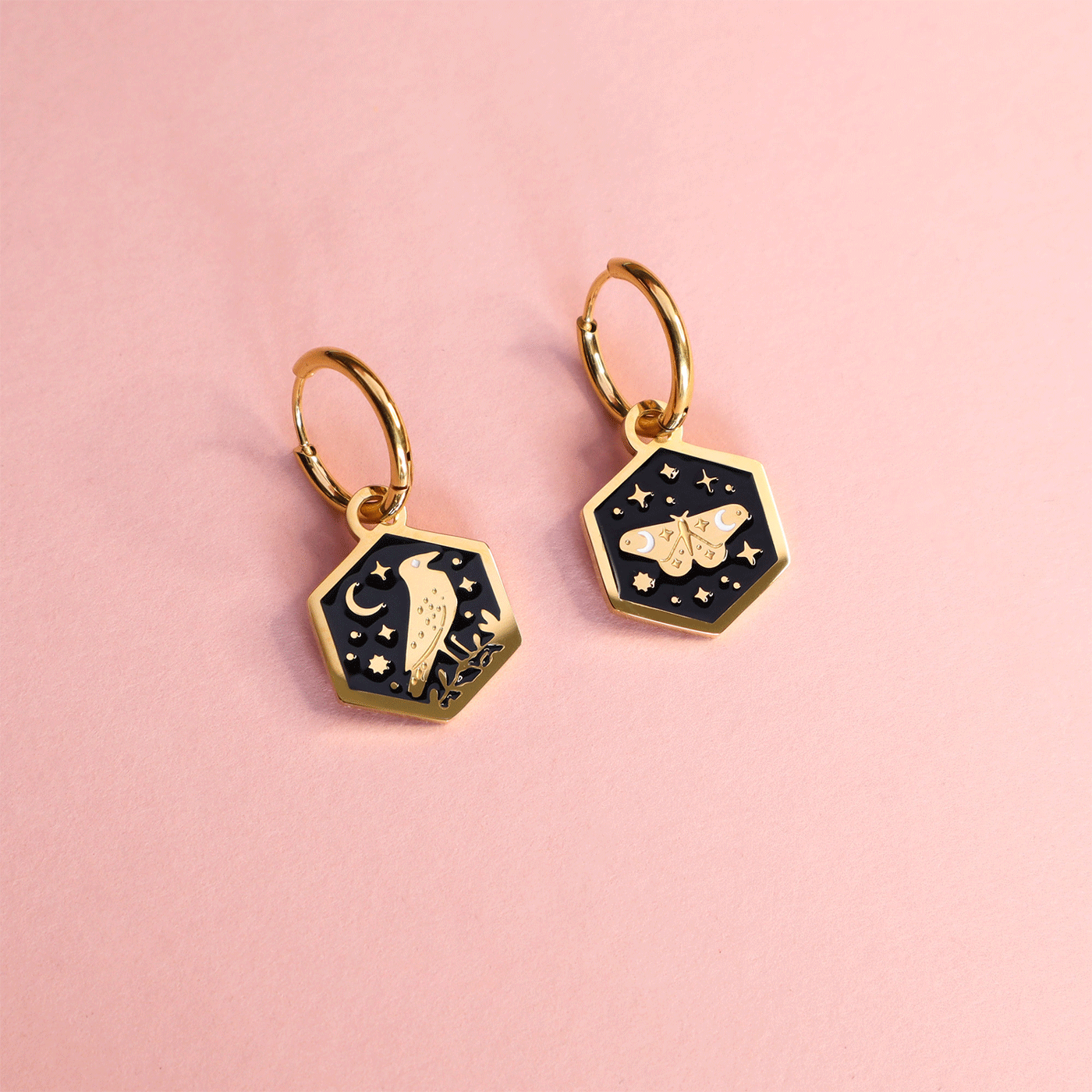 A .gif of Papio Press Mix and Match earrings showing different combinations of Otter, Crow, Moth, Dagger, Fox or Wolf earrings. 