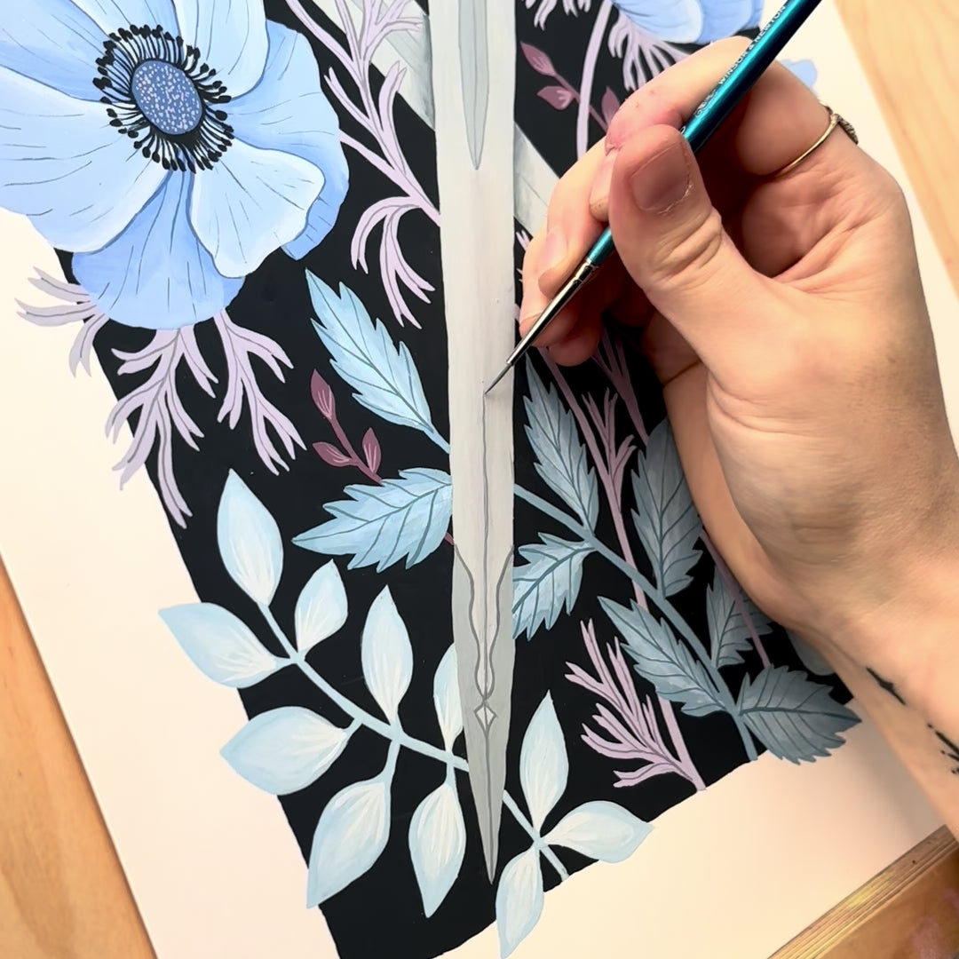 A video of a hand painting the final detail on a sword illustration. 