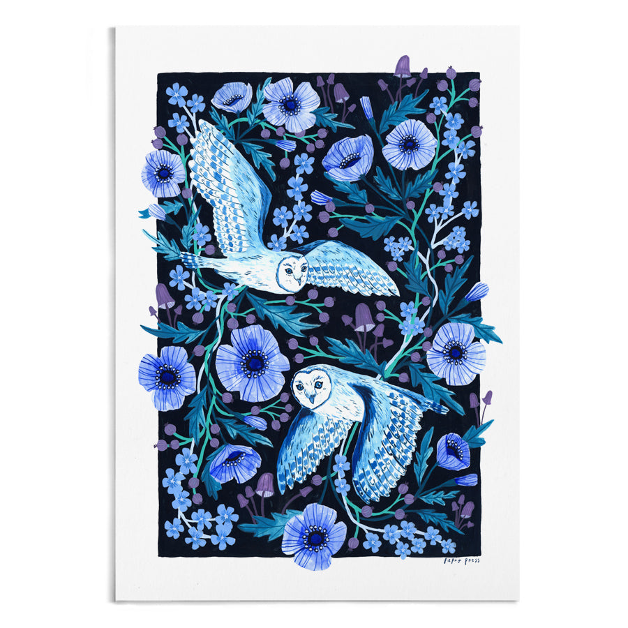 The Night Owls Artists Print by Papio Press features two white barn owls with blue accents soaring among blue and purple flowers and green foliage on a dark rectangle, printed on archival satin paper. Designed in the UK.
